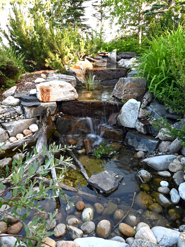 nice water fall feature landscaping
